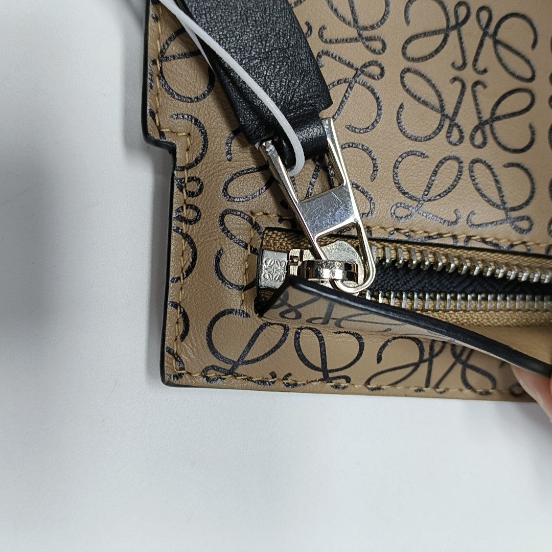 T Pouch Monogram Calfskin Beige