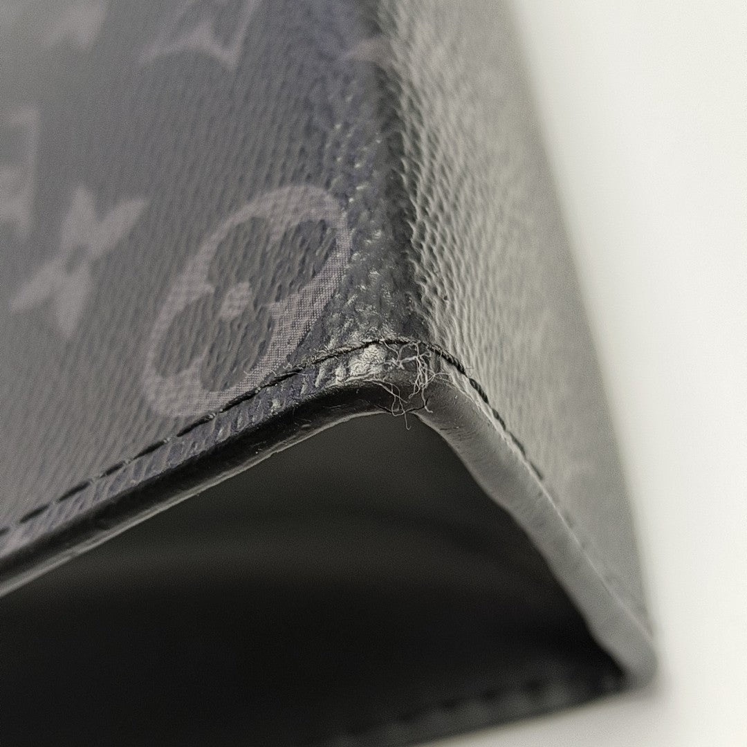 Pochette Voyag MM Monogram Coated Canvas Black
