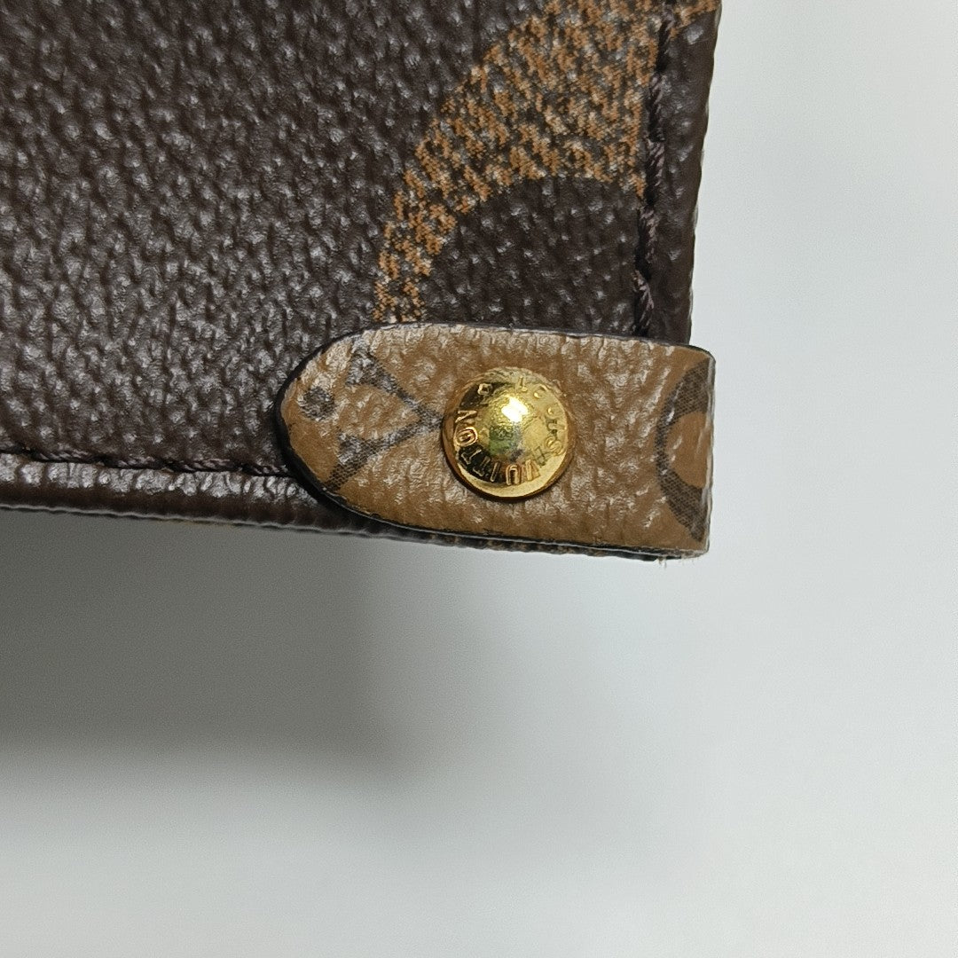 ONTHEGO PM Monogram Coated Canvas Brown