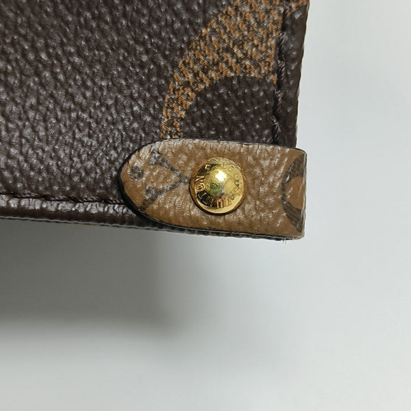 ONTHEGO PM Monogram Coated Canvas Brown