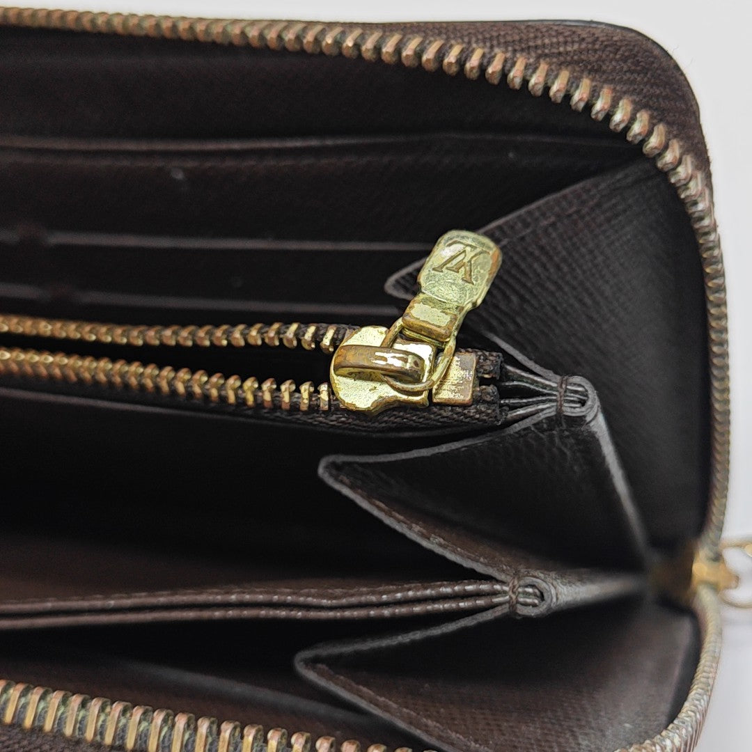 ZIPPY Damier Ebene Coated Canvas Brown Wallet