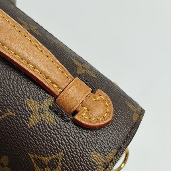 MÉTIS EAST WEST Monogram Coated Canvas Brown