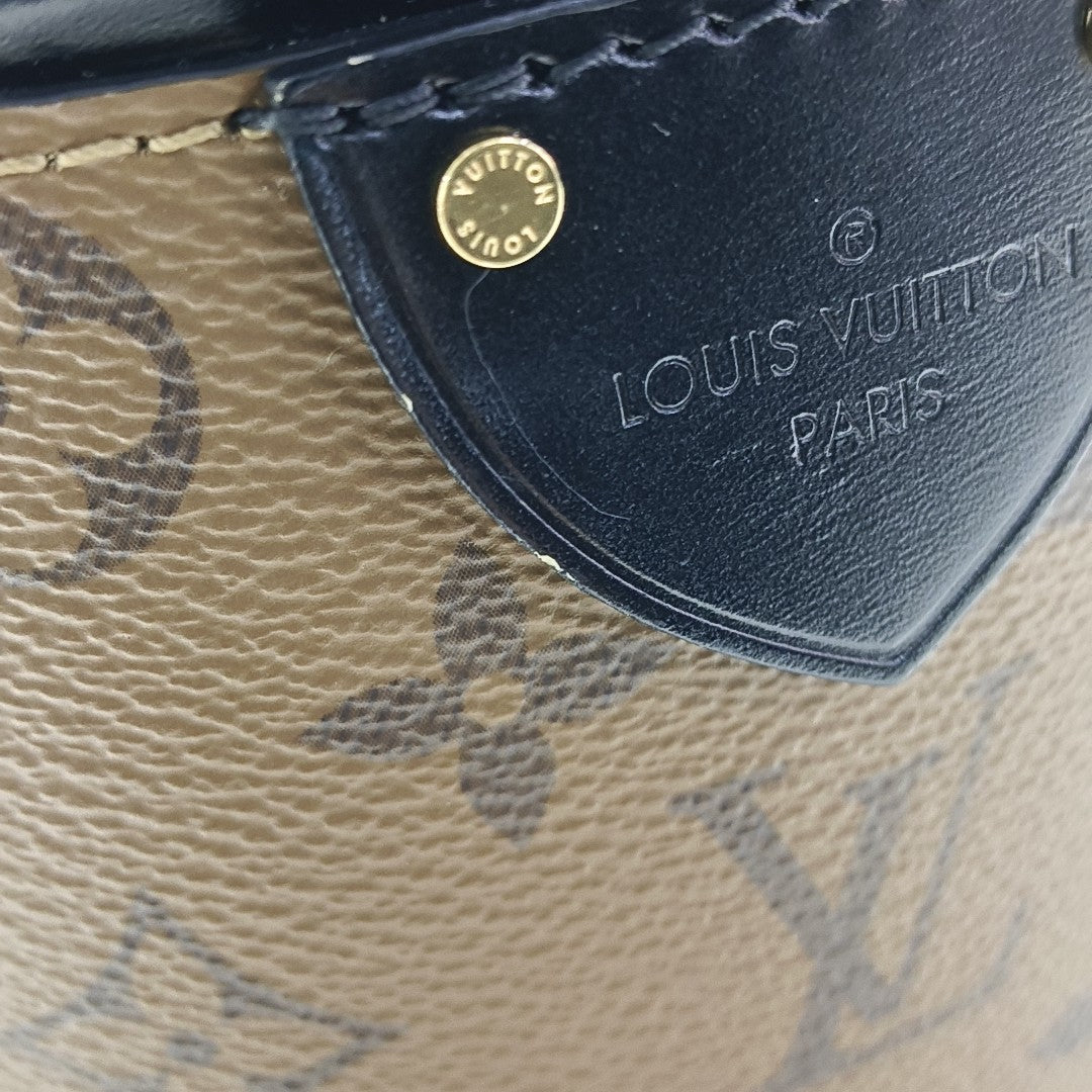 CANNES PM Monogram Coated Canvas Brown