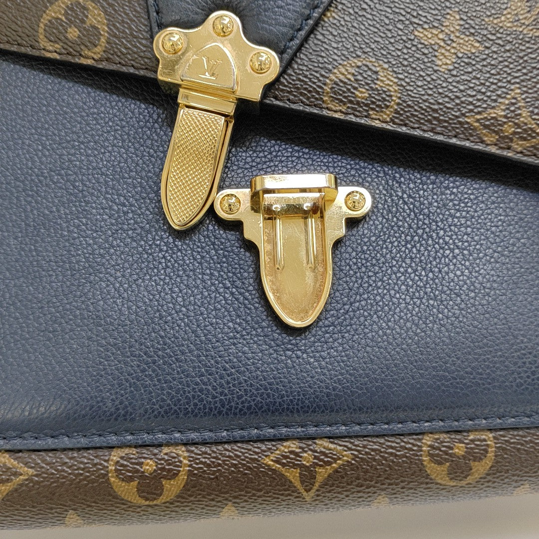 VICTOIRE Monogram Coated Canvas Brown