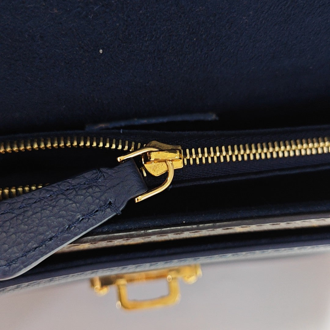 VICTOIRE Monogram Coated Canvas Brown
