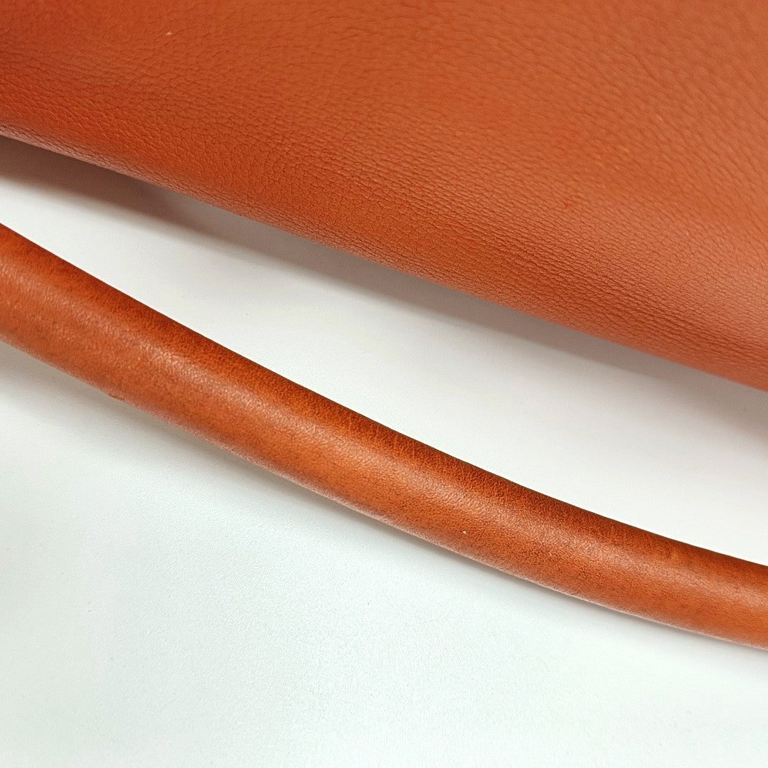 Authenticated pre-owned  Puzzle Calfskin Orange - Shoulder Bag at Looply