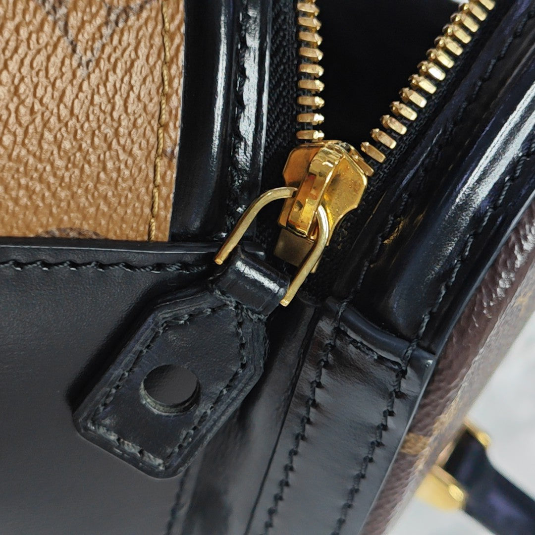 CANNES PM Monogram Coated Canvas Brown
