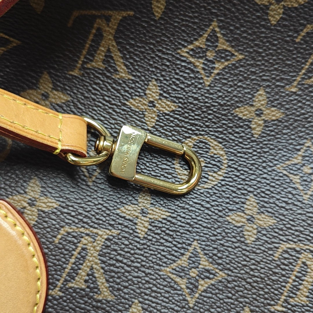 RIVOLI MM Monogram Coated Canvas Brown