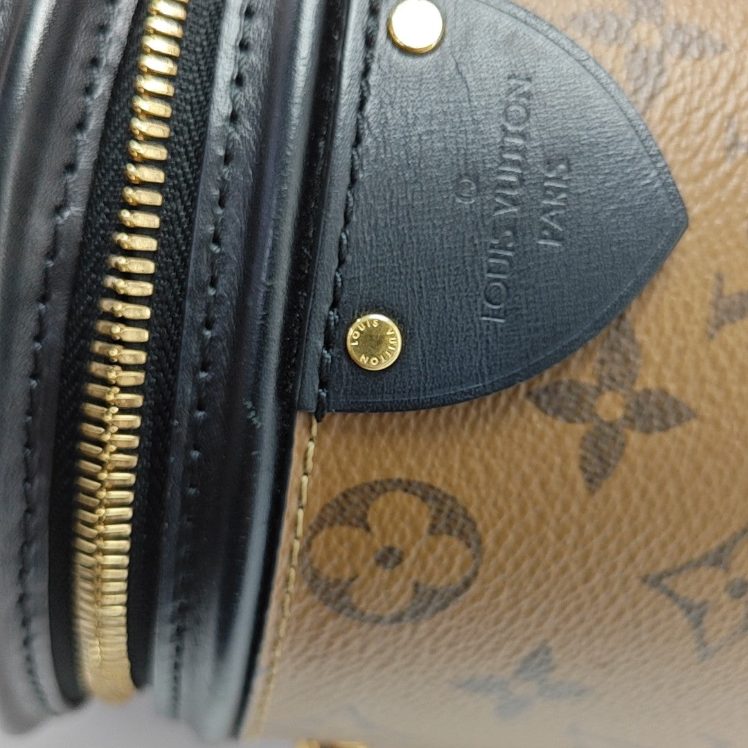 CANNES PM Monogram Coated Canvas Brown