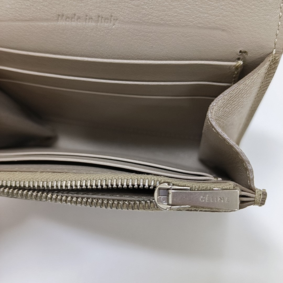 Monedero pequeño TROTTEUR de piel de becerro beige
