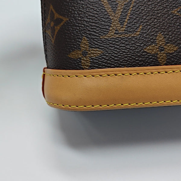 ALMA Mini Monogram Coated Canvas Brown