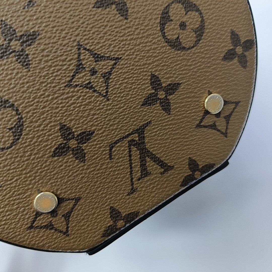 CANNES PM Monogram Coated Canvas Brown