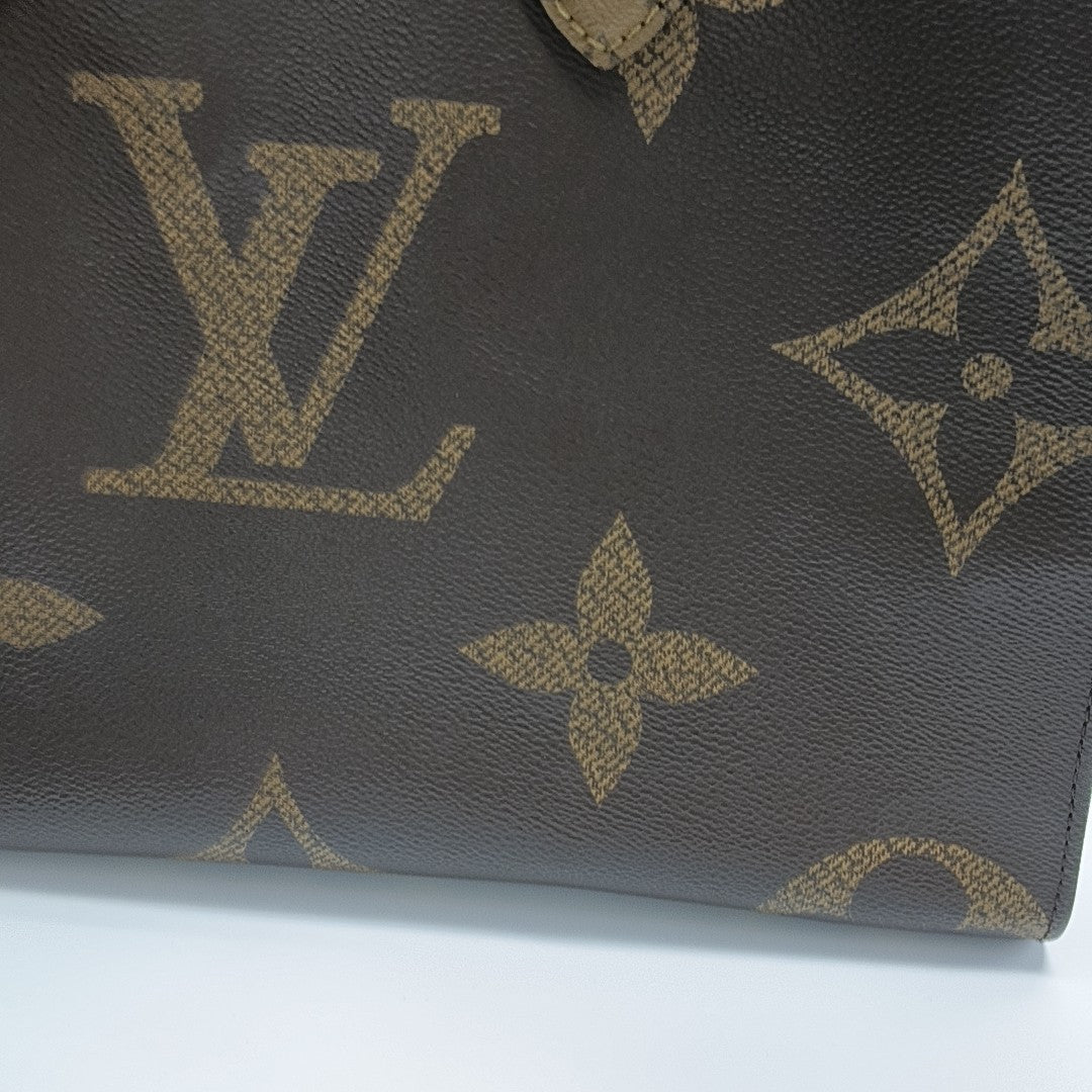ONTHEGO MM Monogram Coated Canvas Brown