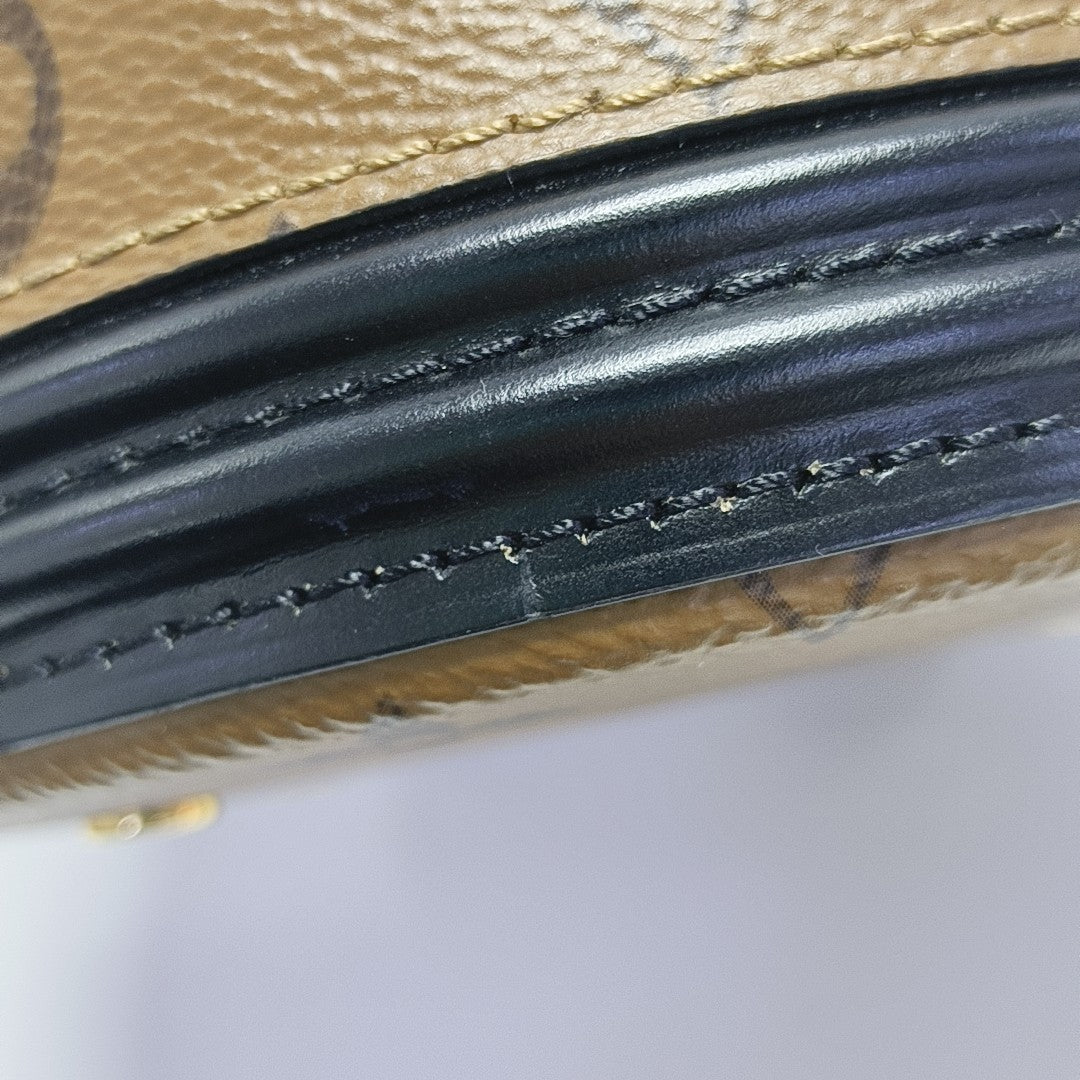 CANNES PM Monogram Coated Canvas Brown