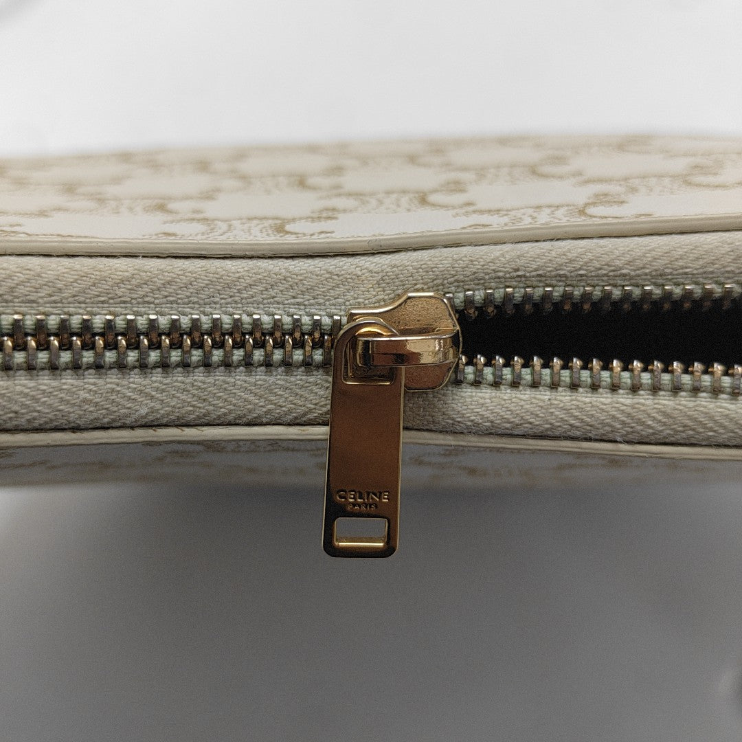 Authenticated pre-owned  AVA Coated Canvas Beige - Top Handle Bag at Looply