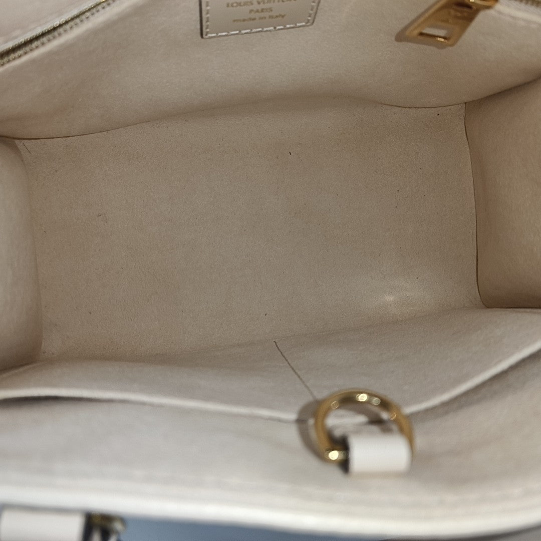 ONTHEGO PM Monogram Calfskin Beige