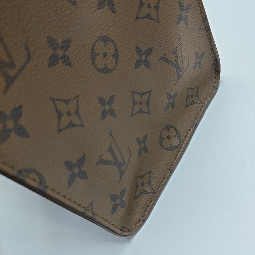 ONTHEGO MM Monogram Coated Canvas Brown