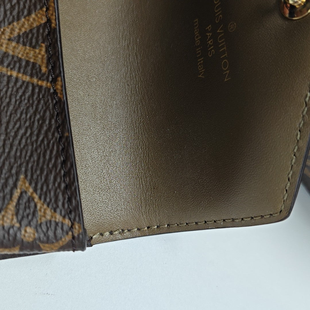 UTILITY Monogram Coated Canvas Brown