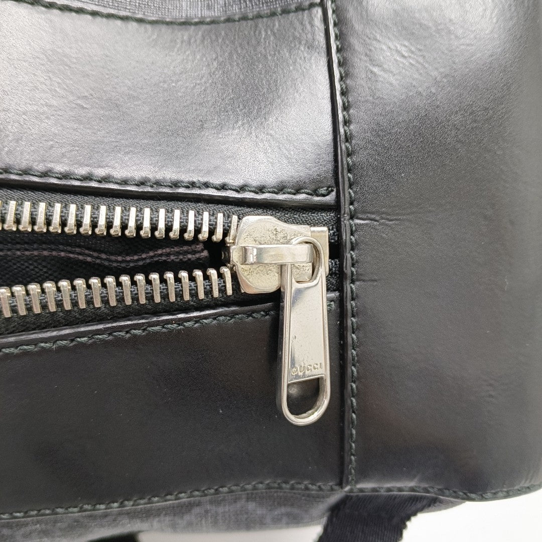 Monogram Coated Canvas Backpack Black