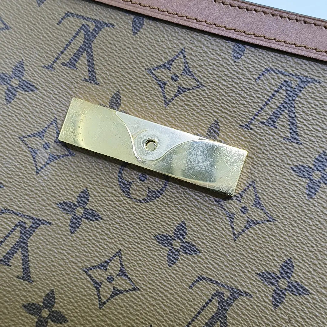 DAUPHINE MM Monogram Coated Canvas Brown