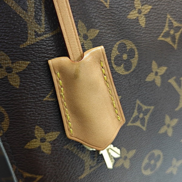MONTAIGNE GM Monogram Coated Canvas Brown