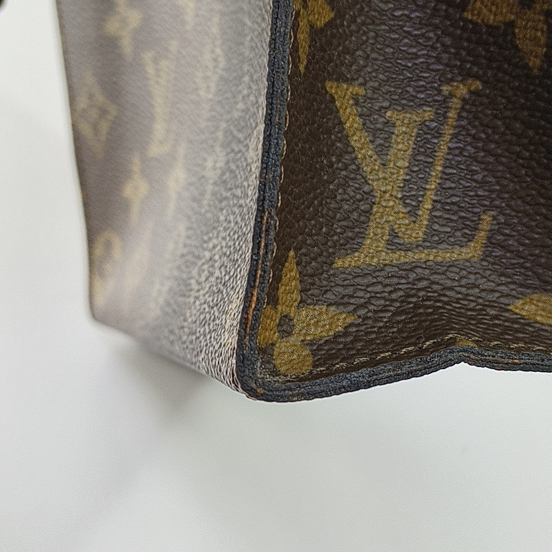 TOILET POCKET Monogram Coated Canvas Brown