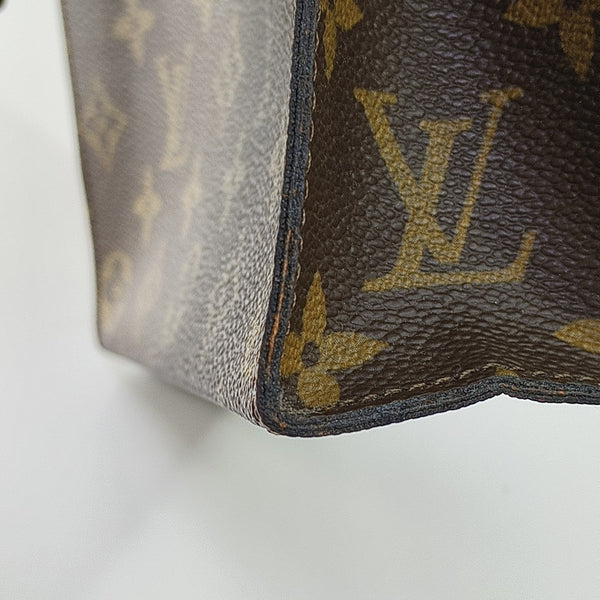 TOILET POCKET Monogram Coated Canvas Brown