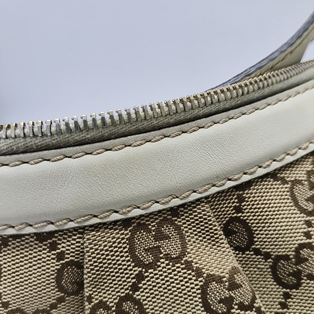 Sukey Monogram Canvas Brown