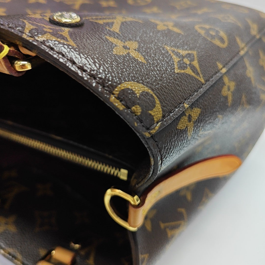 MONTAIGNE GM Monogram Coated Canvas Brown