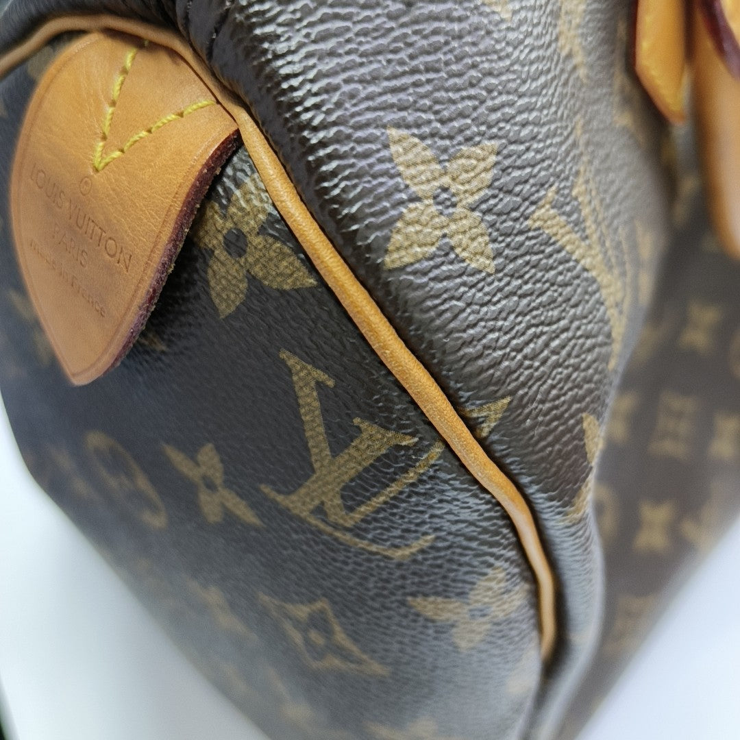 SPEEDY 30 Monogram Coated Canvas Brown