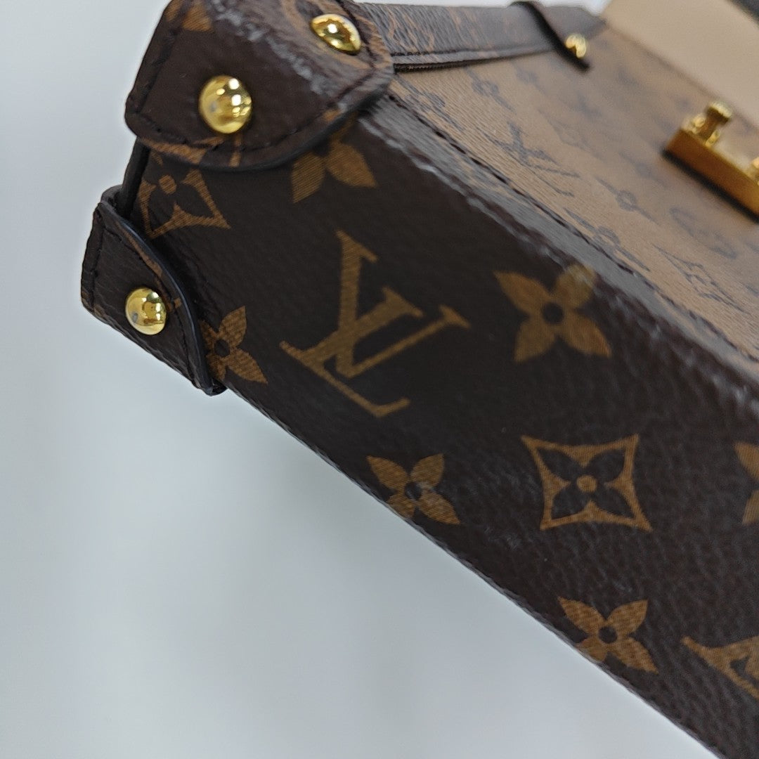TRUNK Monogram Coated Canvas Brown