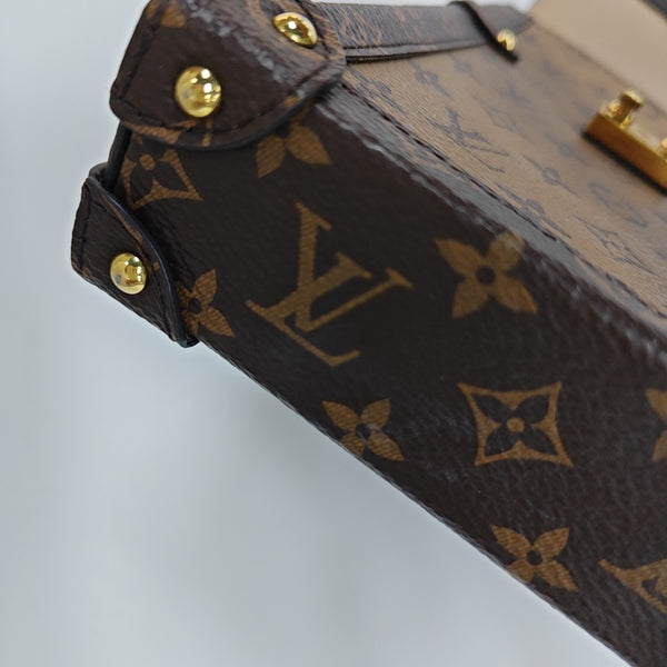 TRUNK Monogram Coated Canvas Brown
