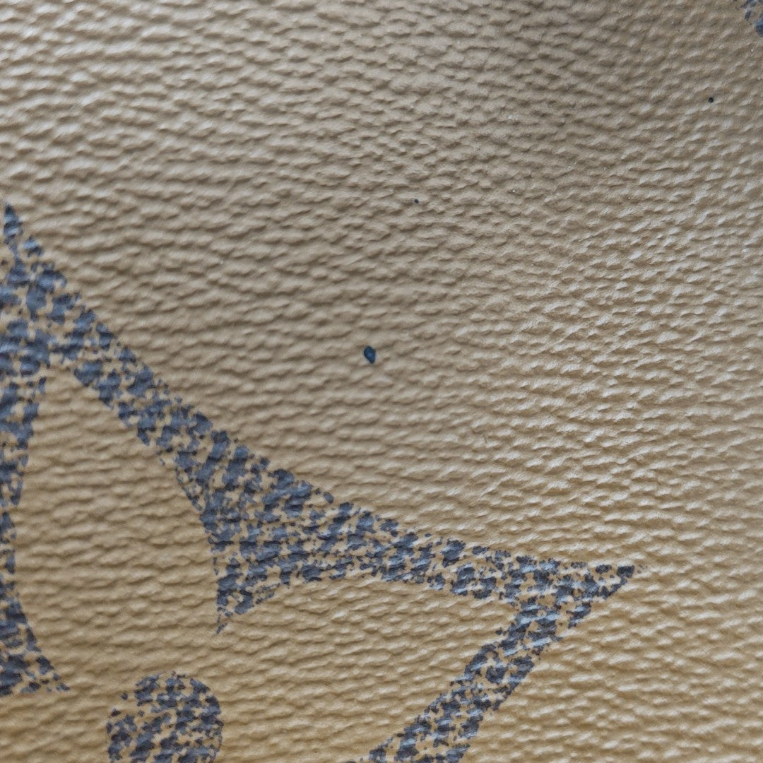 ONTHEGO MM Monogram Coated Canvas Brown