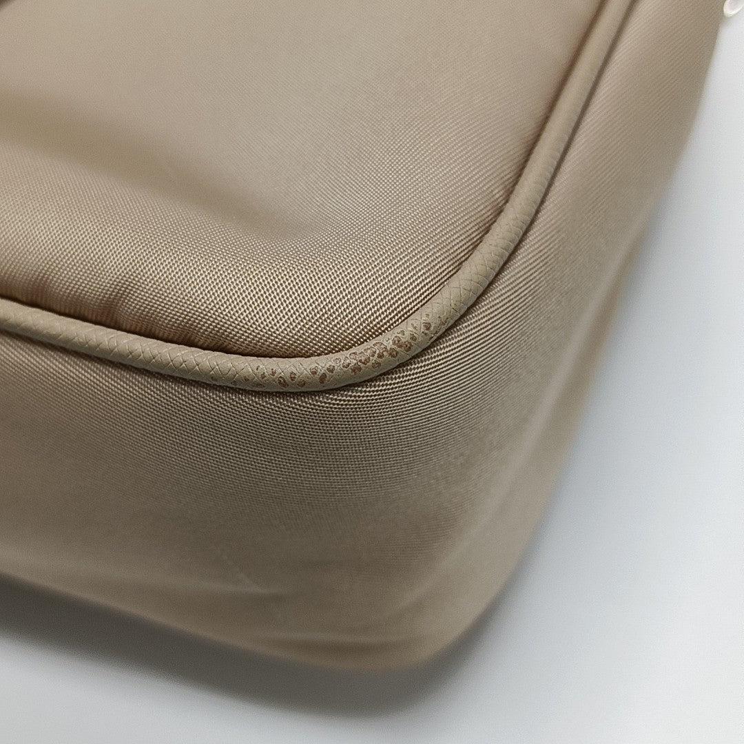 Authenticated pre-owned  Re-Edition2005 Nylon Beige - Shoulder Bag at Looply