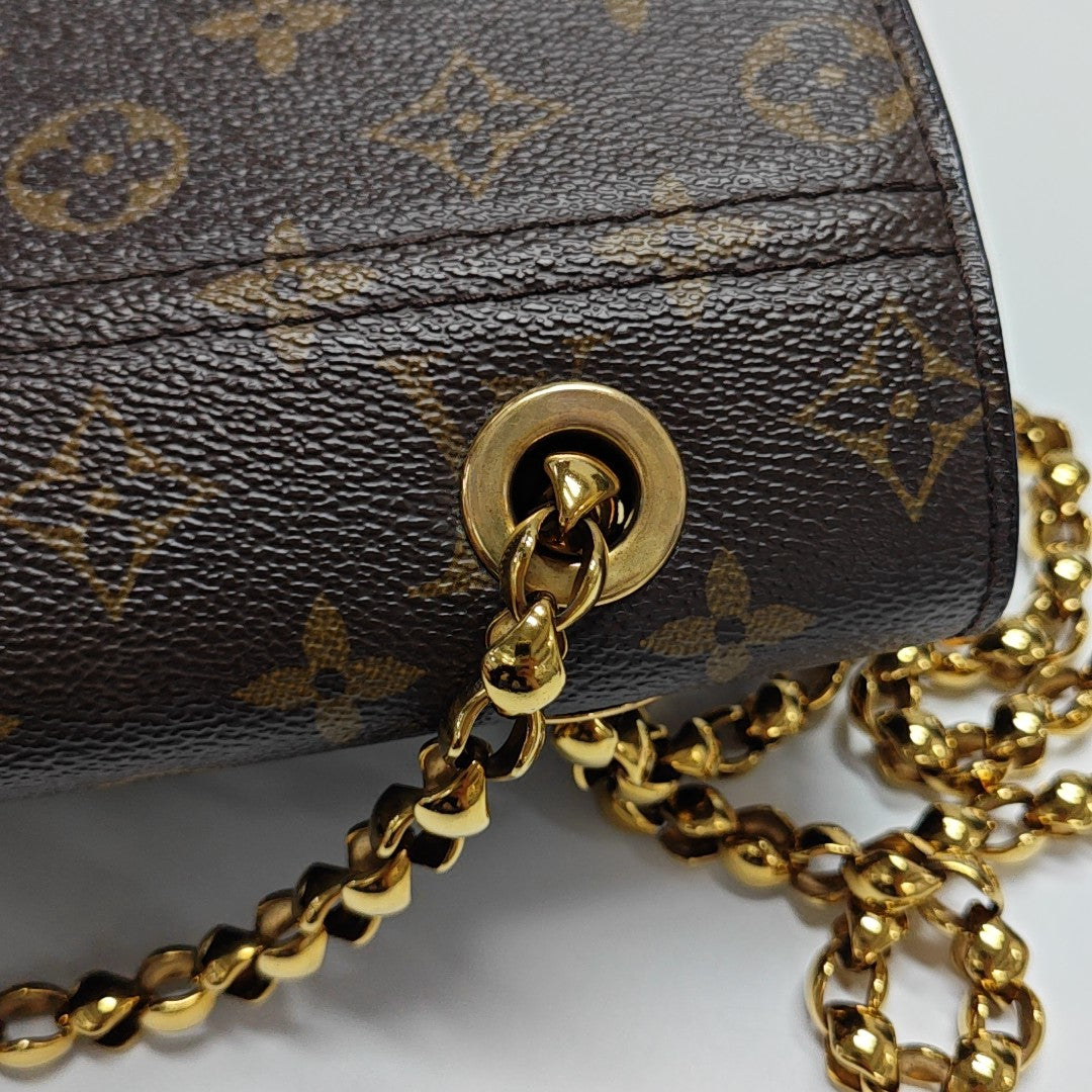 VICTOIRE Monogram Coated Canvas Brown