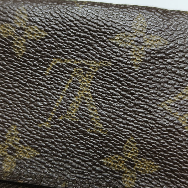 Monogram Coated Canvas Clutch Brown