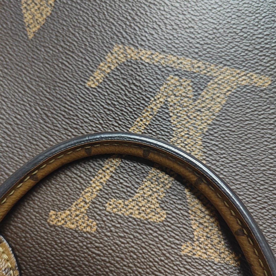 ONTHEGO MM Monogram Coated Canvas Brown