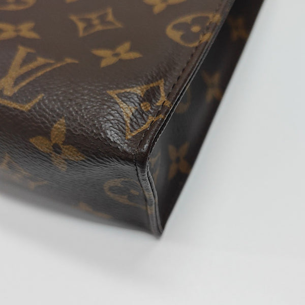 TOILET POCKET 26 Monogram Coated Canvas Brown