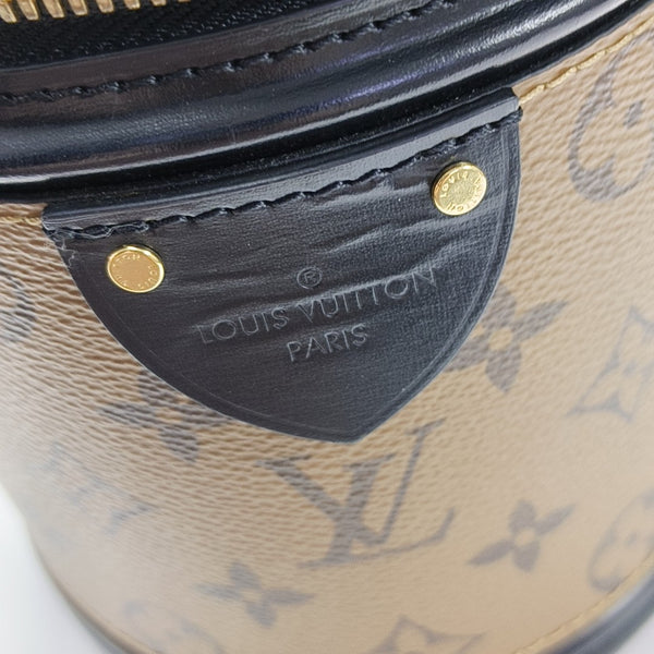 CANNES PM Monogram Coated Canvas Brown