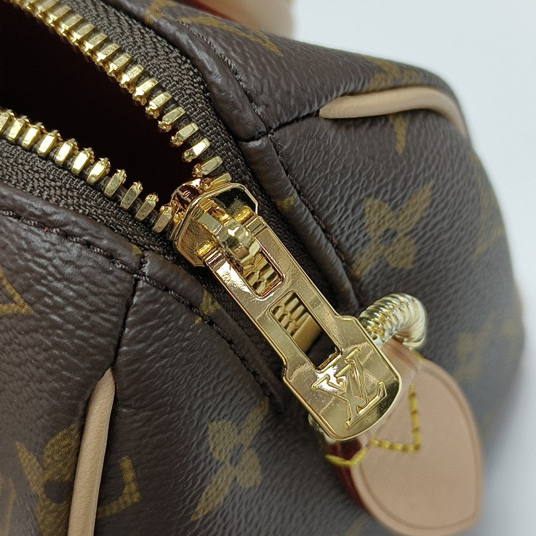 SPEEDY 20 Monogram Coated Canvas Brown