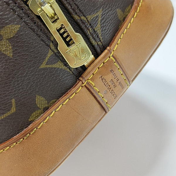 ALMA PM Monogram Coated Canvas Brown