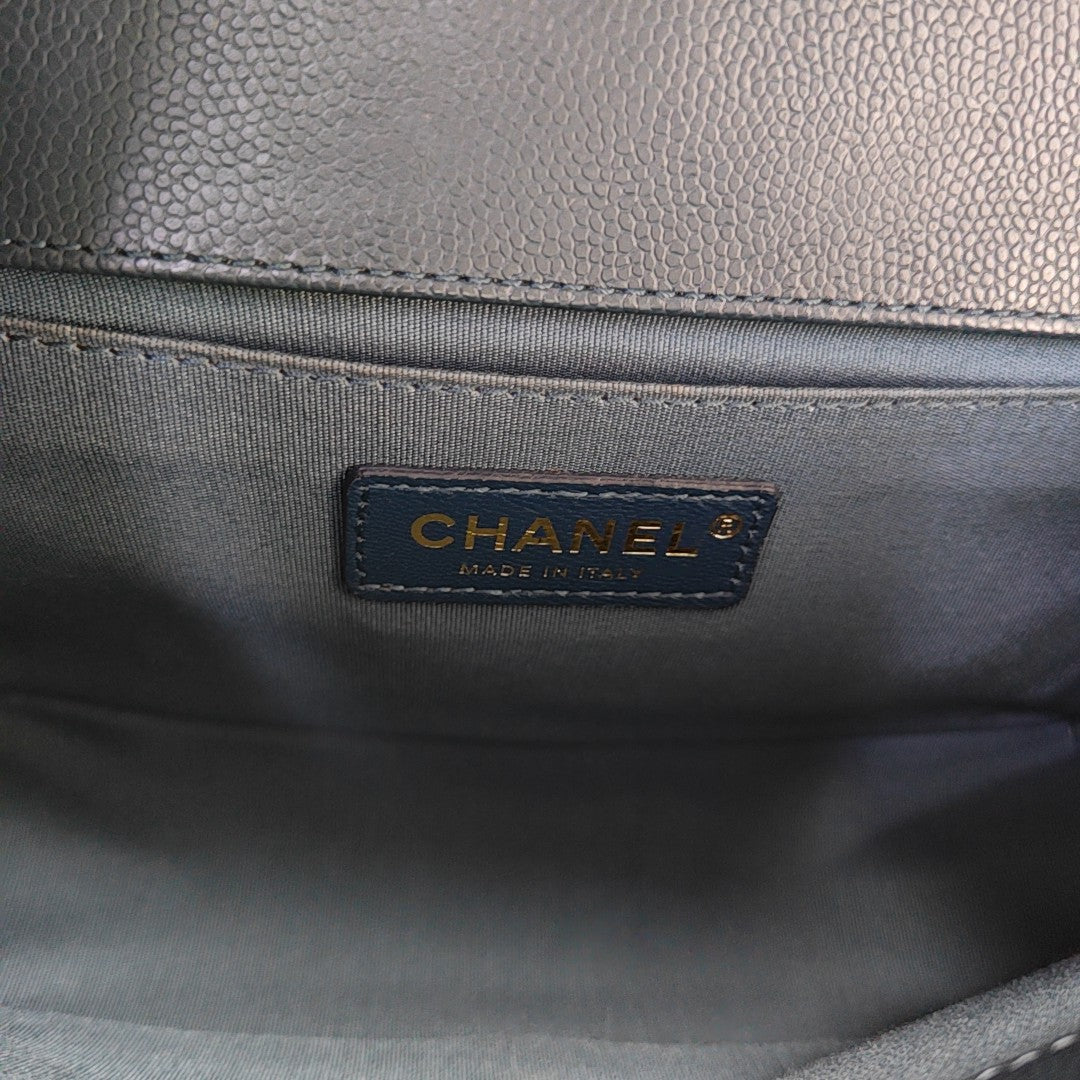 Authenticated pre-owned  BOY CHANEL Medium Chevron, Quilted Grained Calfskin Blue - Shoulder Bag at Looply