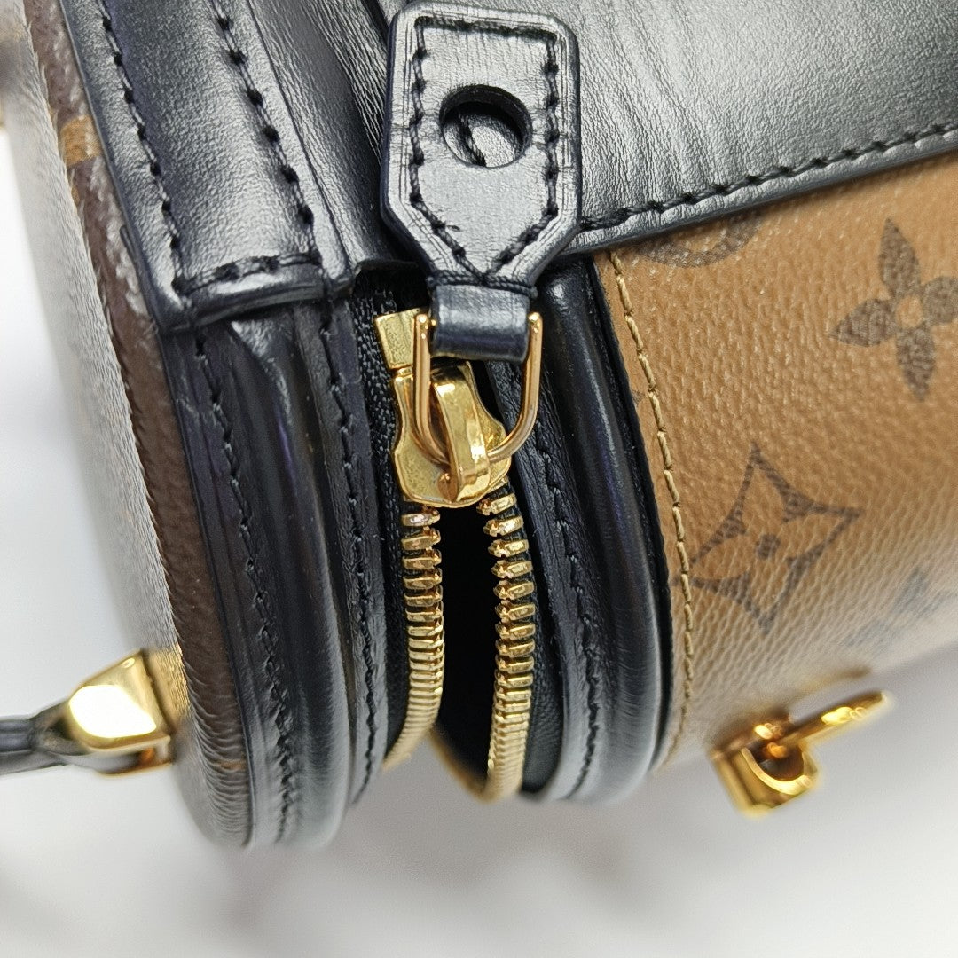 CANNES PM Monogram Coated Canvas Brown