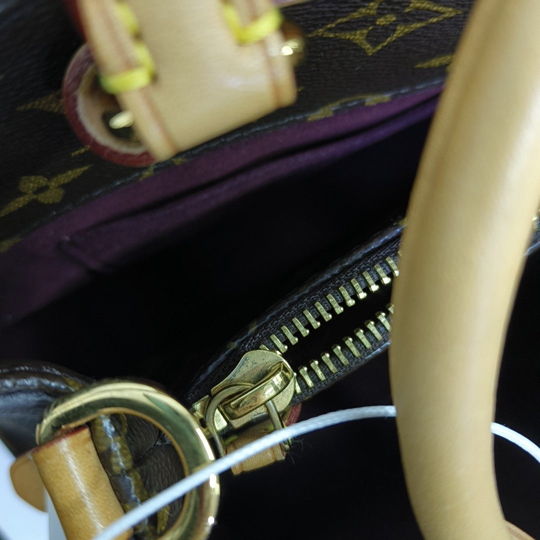MONTAIGNE Monogram Coated Canvas Brown