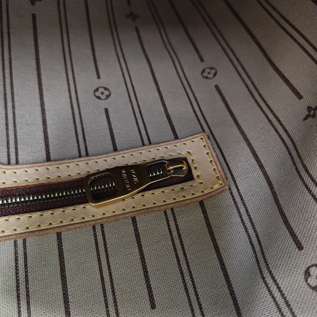 DELIGHTFUL PM Monogram Coated Canvas Brown