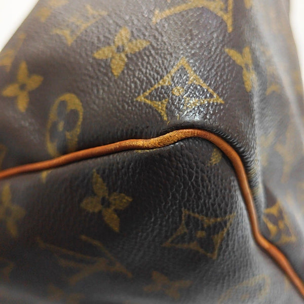SPEEDY 25 Monogram Coated Canvas Brown