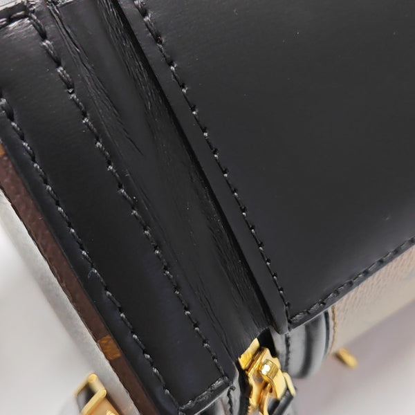 CANNES PM Monogram Coated Canvas Brown