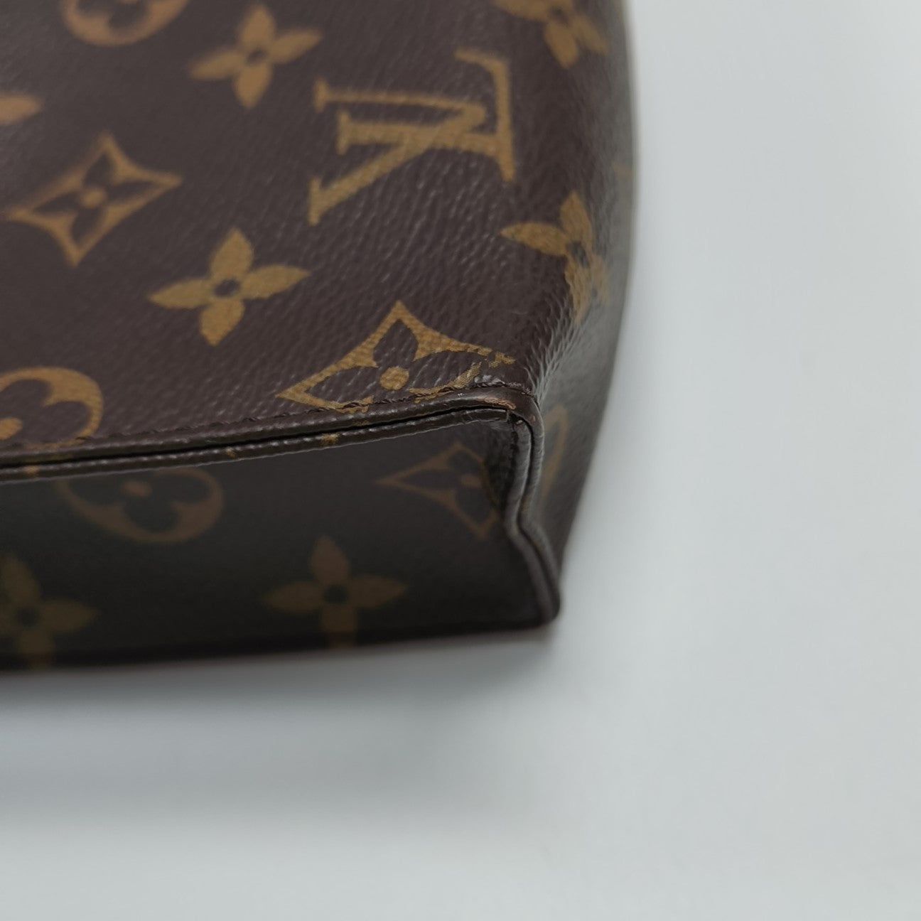 TOILET POCKET 26 Monogram Coated Canvas Brown