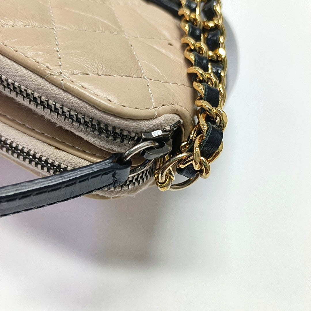 Authenticated pre-owned  GABRIELLE Mini Quilted Calfskin Beige - Shoulder Bag at Looply