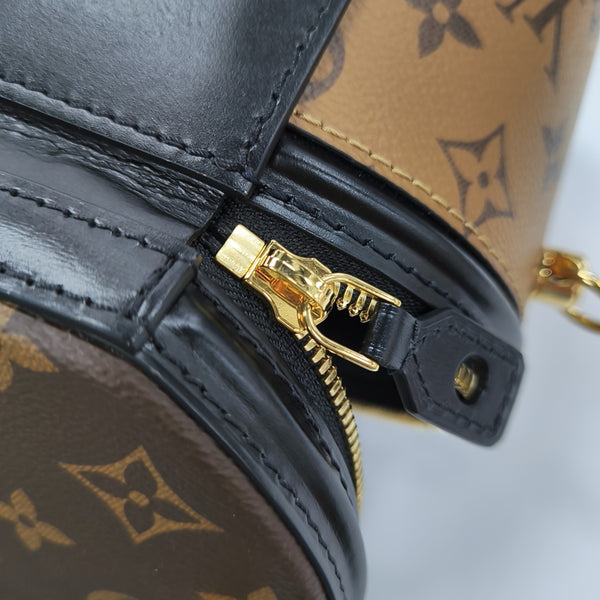 CANNES PM Monogram Coated Canvas Brown